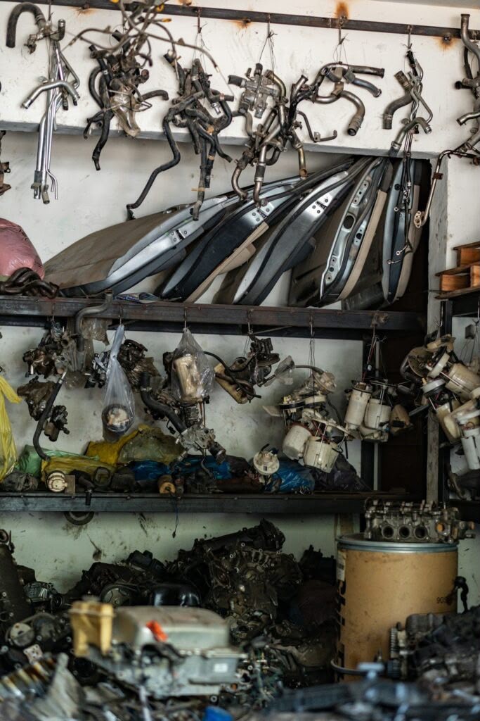 Assorted vehicle parts and components on display